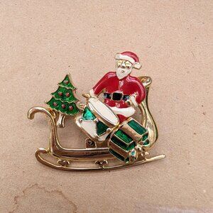 Vintage Gold Tone Sleigh Brooch with removable Enamel Santa, Gift, & Tree